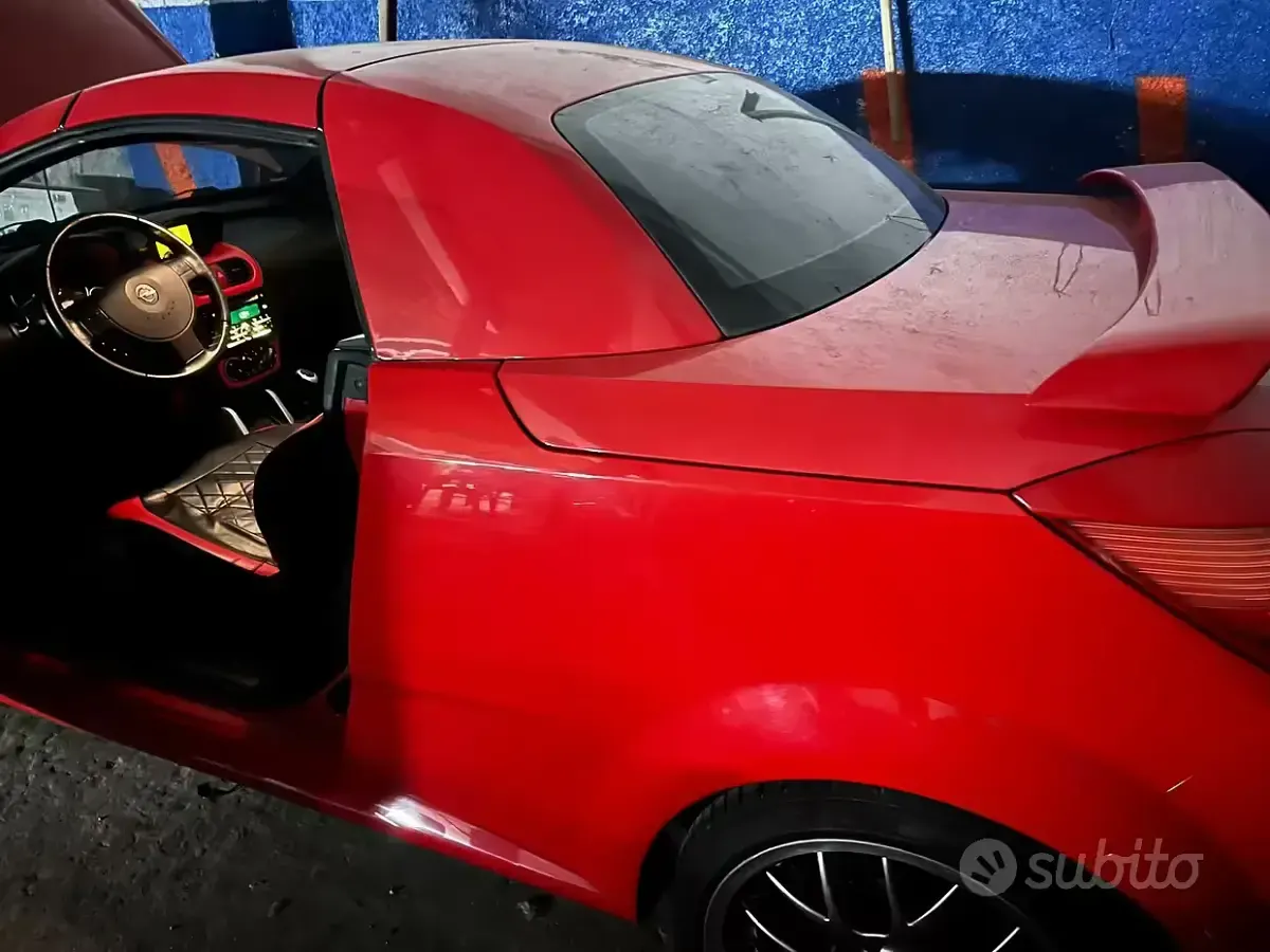 Usata Opel Tigra 90 CV (66 kW) 2006 Rosso Cabrio