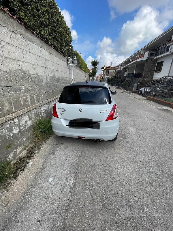 Usata Suzuki Swift 94 CV (69 kW) 2011 Bianco Utilitaria