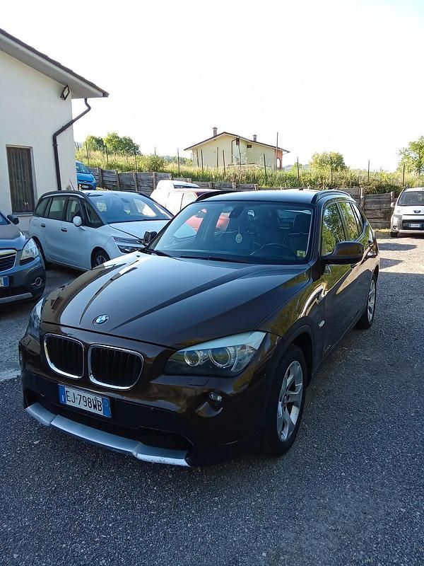 Usata BMW X1 176 CV (129 kW) 2011 Marrone SUV