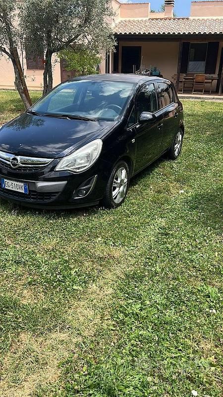 Usata Opel Corsa Cosmo 69 CV (50 kW) 2010 Nero Berlina