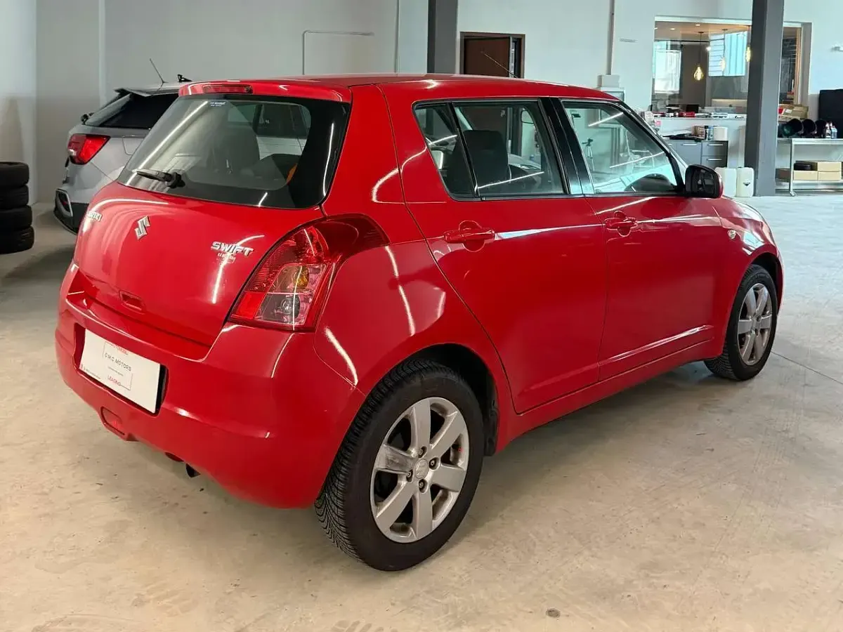 Usata Suzuki Swift GL 91 CV (66 kW) 2009 Bright red Utilitaria