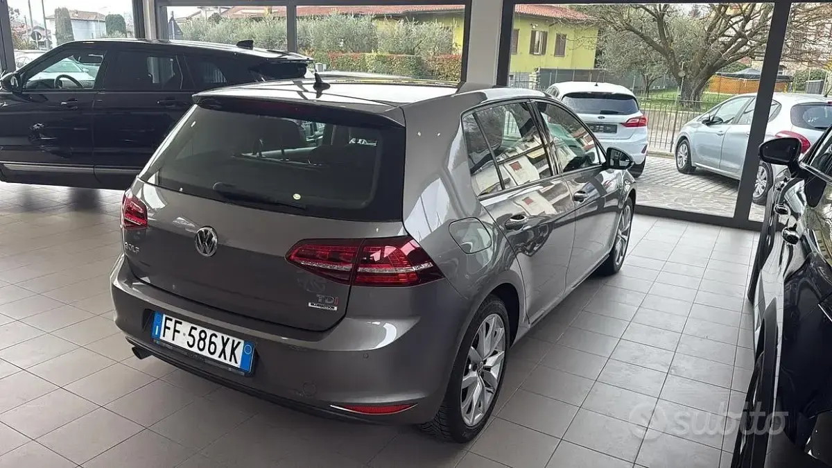 Używany VW Golf VII Executive 110 KM (80 kW) 2017 Żółty Sedan/Limuzyna
