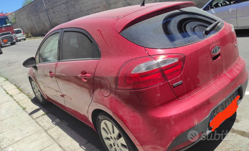 Usata Kia Rio 90 CV (66 kW) 2011 Rosso Berlina