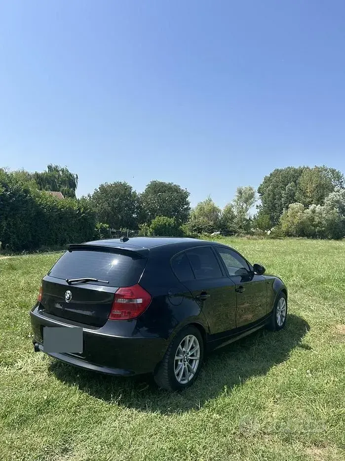 Usata BMW 118 143 CV (105 kW) 2010 Nero Utilitaria