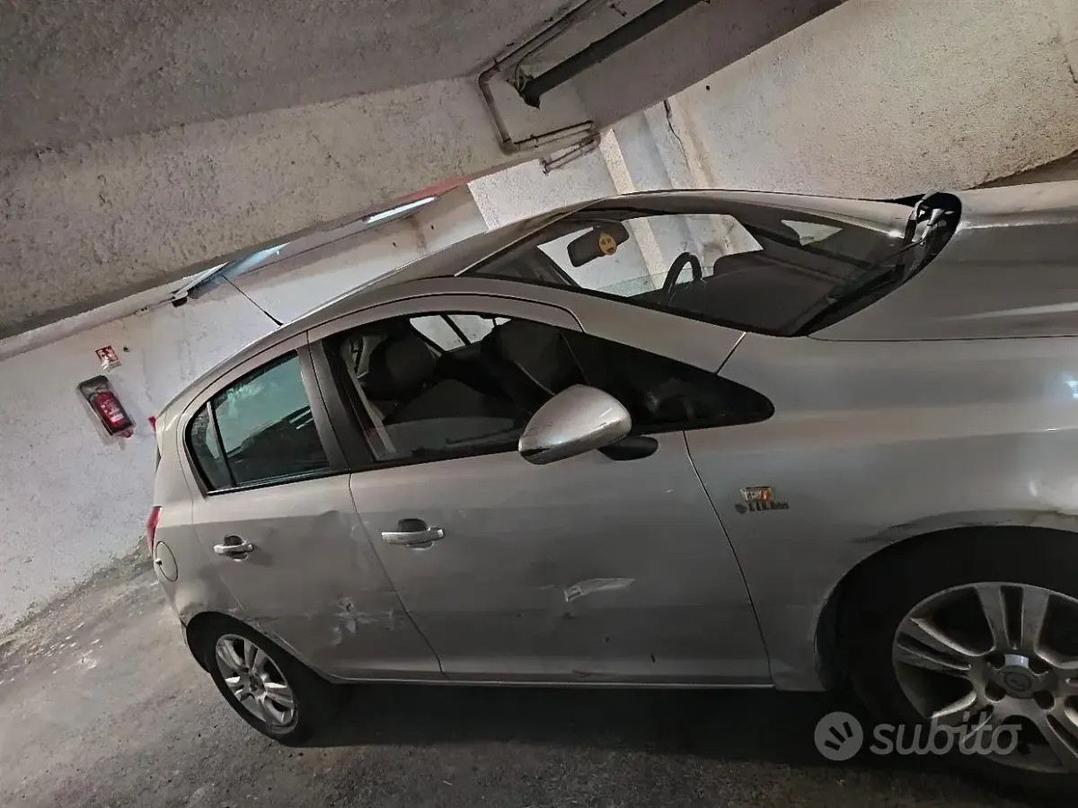 Usata Opel Corsa 95 CV (69 kW) 2012 Grigio Utilitaria