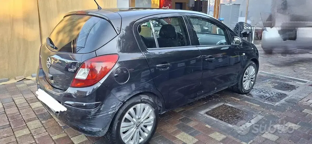 Usata Opel Corsa 95 CV (69 kW) 2012 Nero Utilitaria