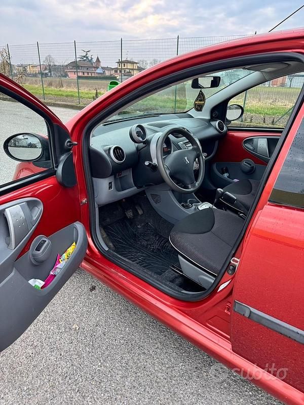 Usata Peugeot 107 68 CV (50 kW) 2009 Rosso Utilitaria