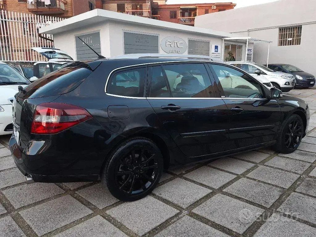 Usata Renault Laguna III 150 CV (110 kW) 2010 Nero Station wagon