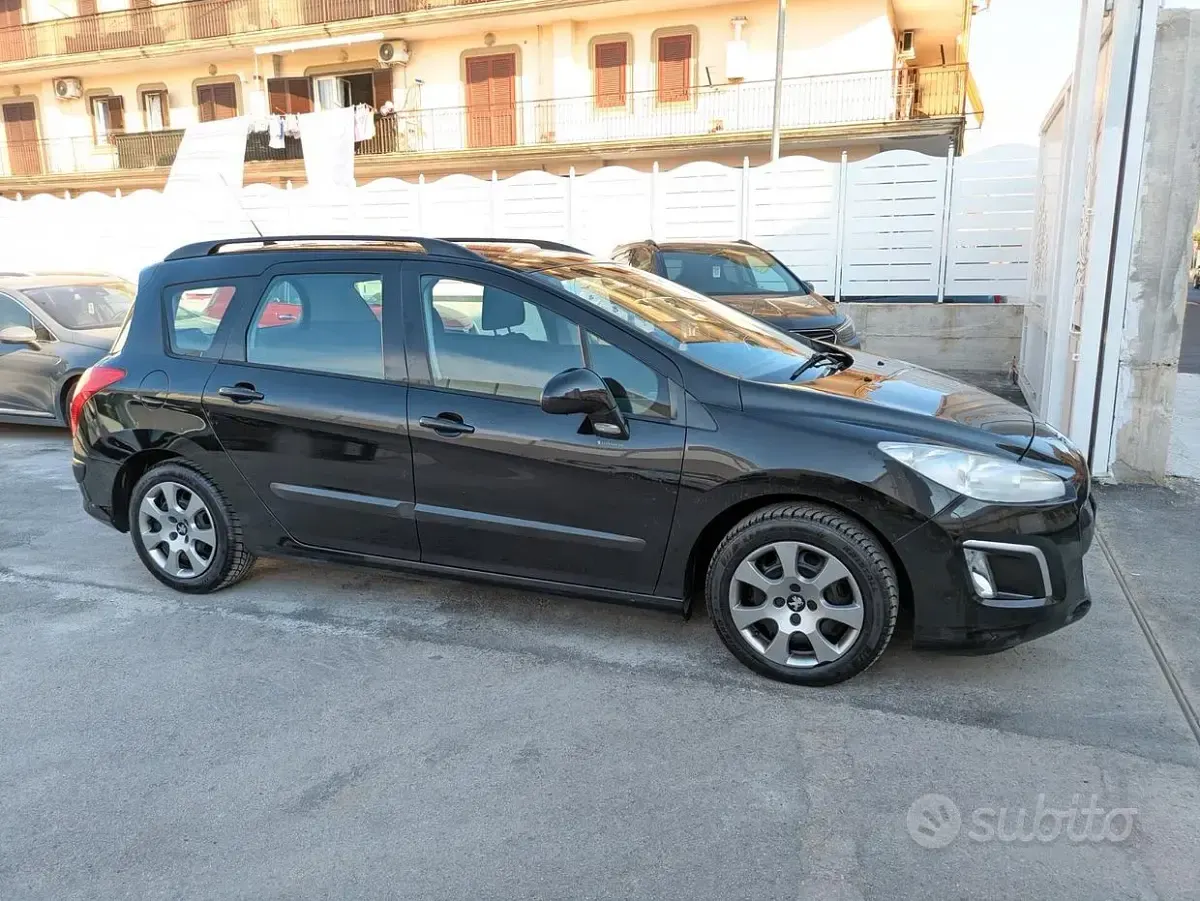 Usata Peugeot 308 SW 93 CV (68 kW) 2012 Nero Station wagon
