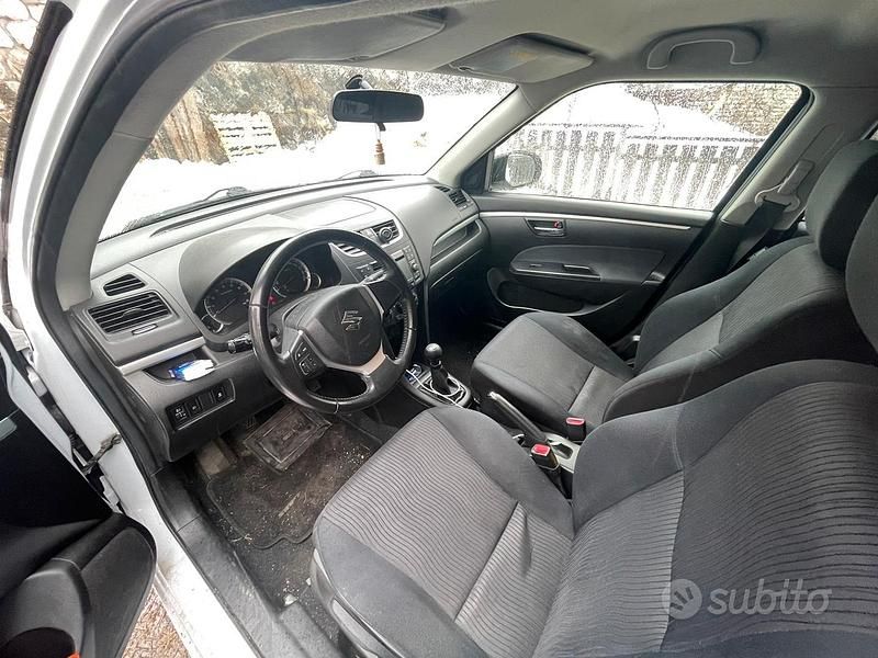 Second-hand Suzuki Swift 94 CP (69 kW) 2013 Alb Berlinǎ