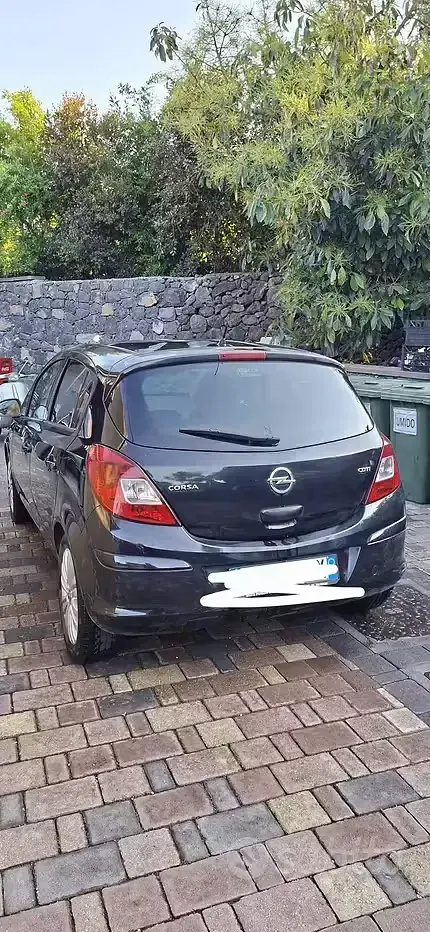 Usata Opel Corsa 95 CV (69 kW) 2012 Nero Utilitaria