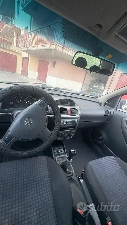 Używany Opel Corsa 69 KM (50 kW) 2004 Niebieski Hatchback
