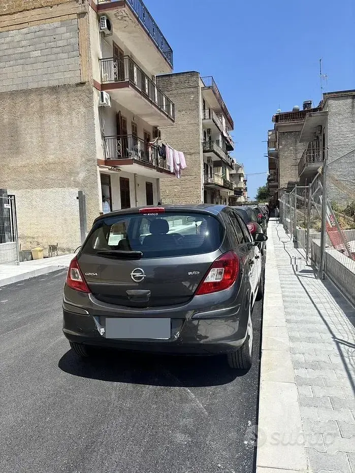 Usata Opel Corsa 85 CV (62 kW) 2012 Grigio Utilitaria
