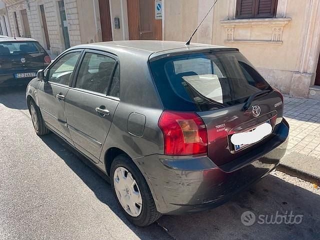 Usata Toyota Corolla 97 CV (71 kW) 2003 Grigio Berlina