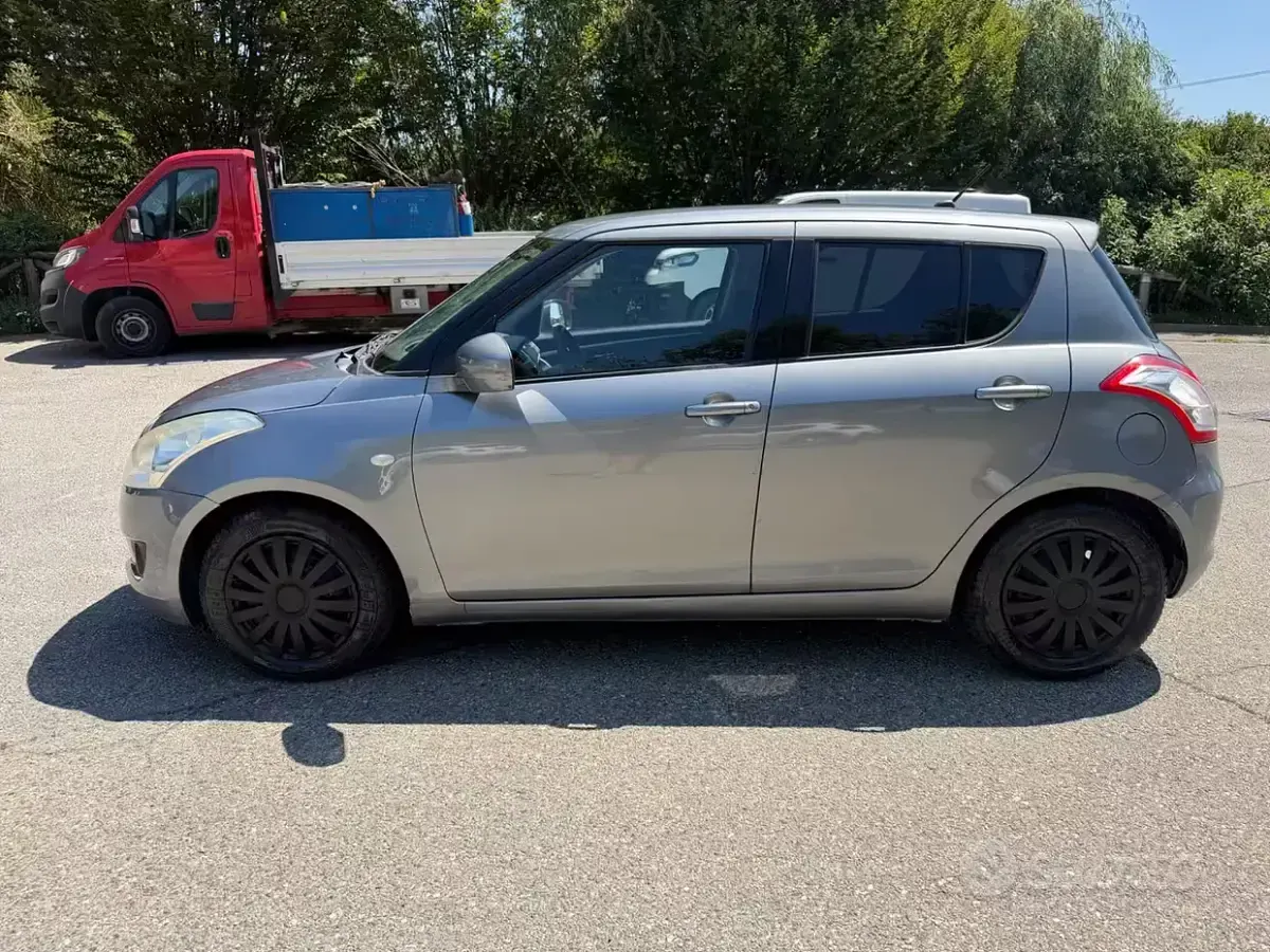 Usata Suzuki Swift GL 94 CV (69 kW) 2012 Marrone Utilitaria