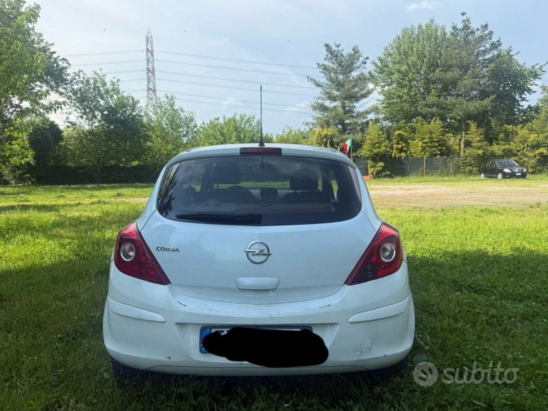 Usata Opel Corsa 54 CV (39 kW) 2014 Bianco Utilitaria
