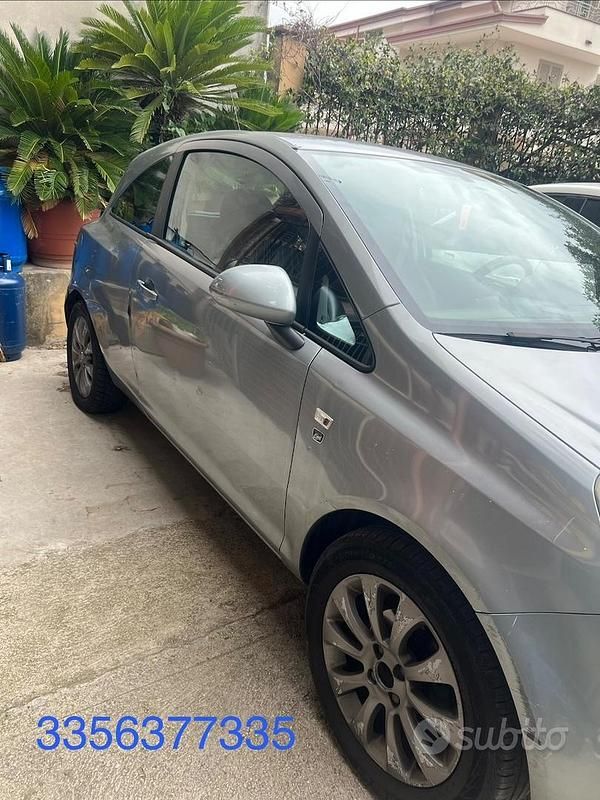 Usata Opel Corsa 95 CV (69 kW) 2011 Grigio Utilitaria
