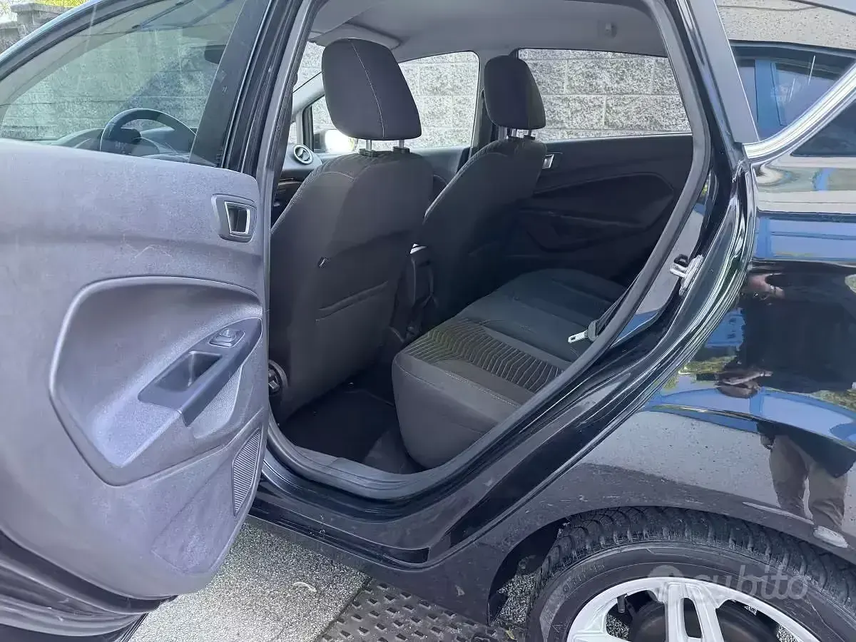 Usado Ford Fiesta Titanium 75 CV (55 kW) 2014 Negro Utilitario