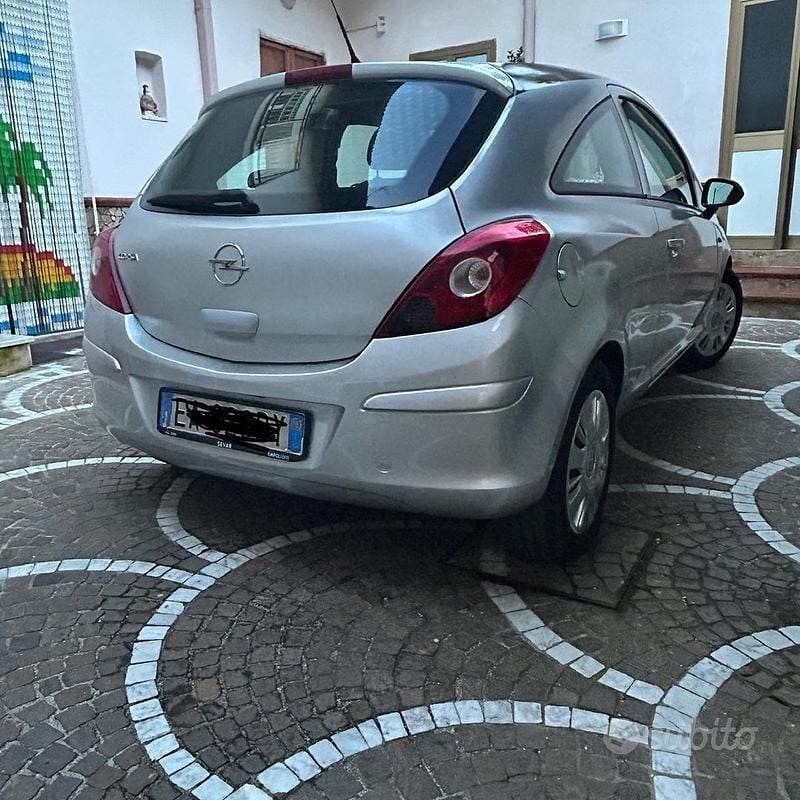 Usata Opel Corsa 80 CV (58 kW) 2010 Grigio Utilitaria