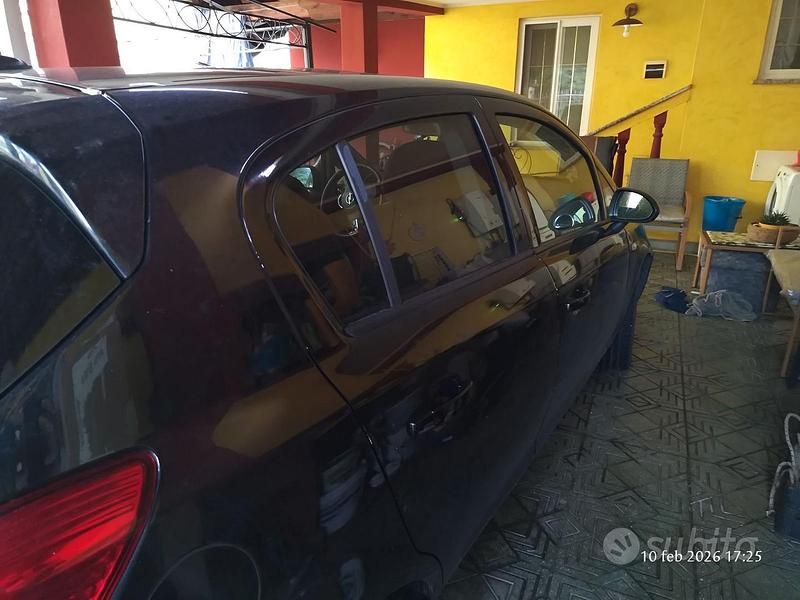 Usata Opel Corsa Cosmo 85 CV (62 kW) 2011 Nero Utilitaria