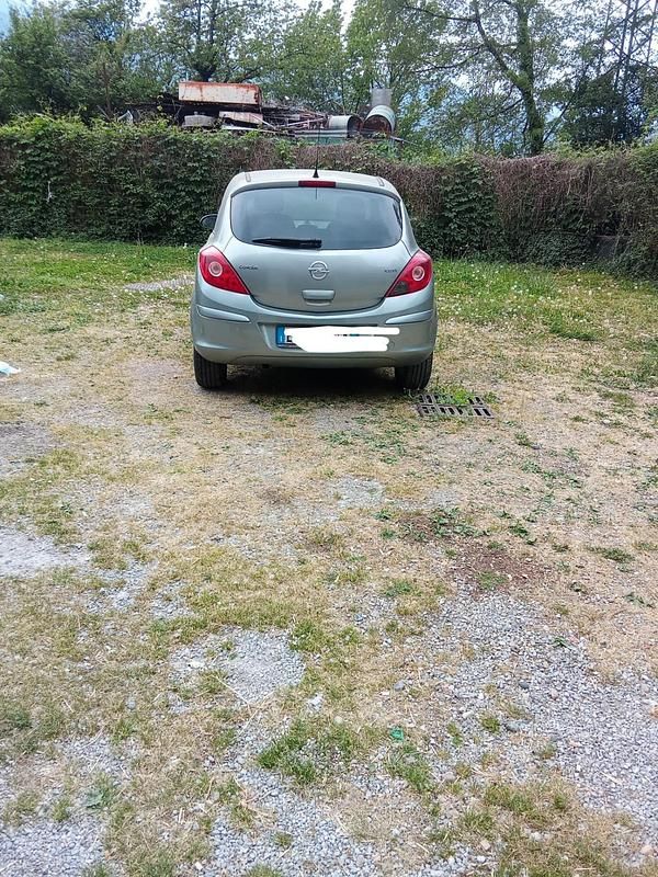 Usata Opel Corsa 59 CV (43 kW) 2012 Argento Utilitaria