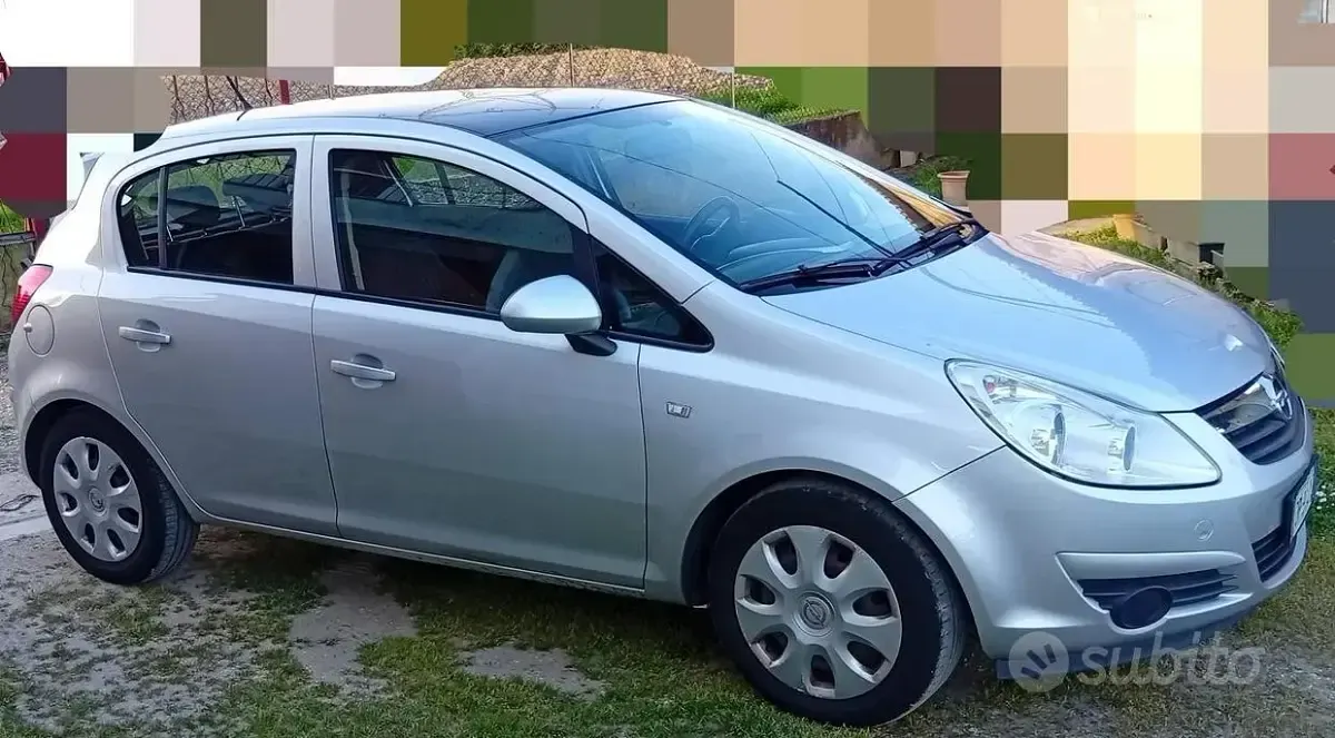 Usata Opel Corsa 65 CV (47 kW) 2009 Grigio Utilitaria