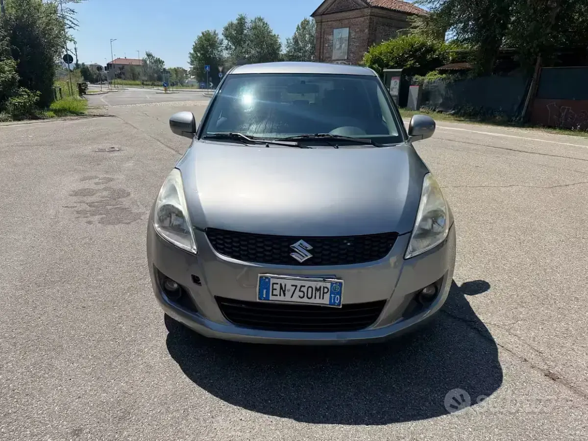 Usata Suzuki Swift GL 94 CV (69 kW) 2012 Marrone Utilitaria