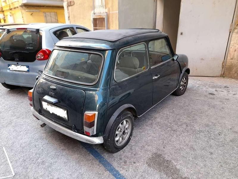Usata Rover Mini 50 CV (36 kW) 1996 Verde Utilitaria