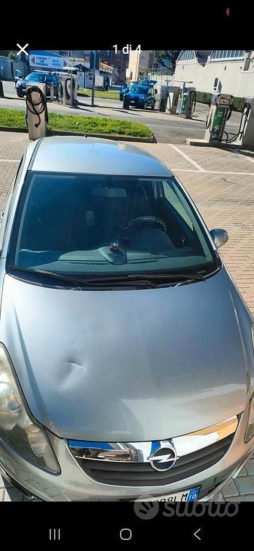 Usado Opel Corsa 85 HP (62 kW) 2011 Cinzento Citadino