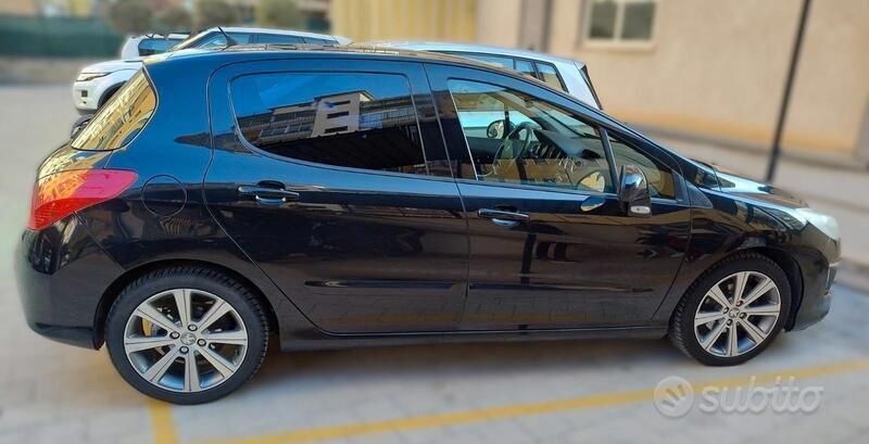 Usata Peugeot 308 112 CV (82 kW) 2012 Nero Berlina