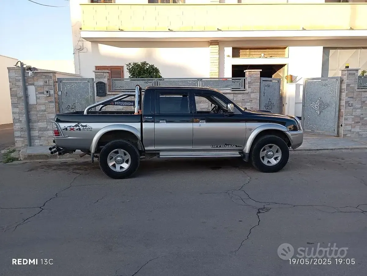 Usata Mitsubishi L 115 CV (84 kW) 2006 Nero SUV
