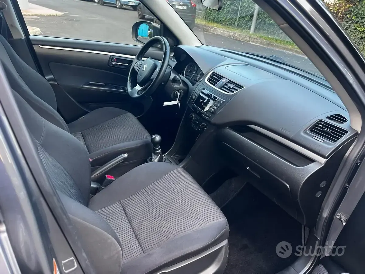 Usata Suzuki Swift 94 CV (69 kW) 2013 Grigio Utilitaria
