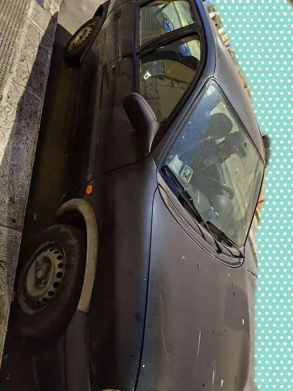 Usata Opel Corsa Swing 54 CV (39 kW) 1999 Nero Berlina
