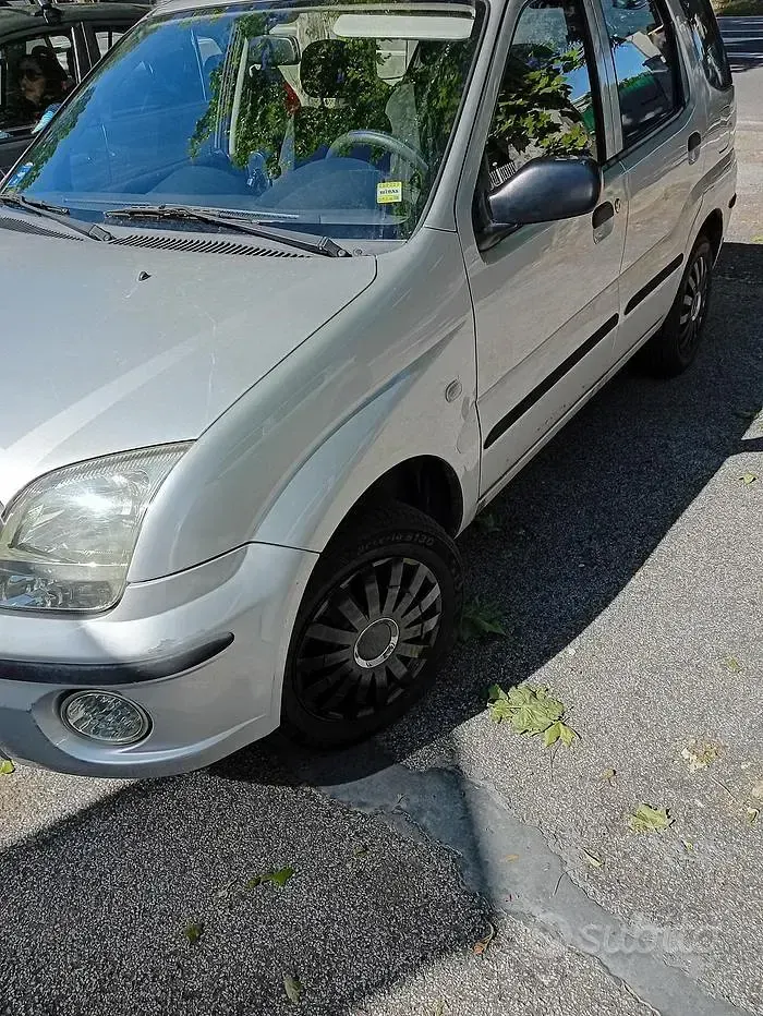 Usata Subaru Justy 94 CV (69 kW) 2005 Grigio Utilitaria