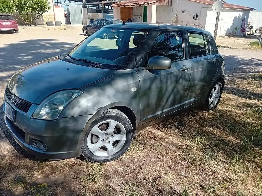 Usata Suzuki Swift GLX 91 CV (66 kW) 2005 Grigio Utilitaria