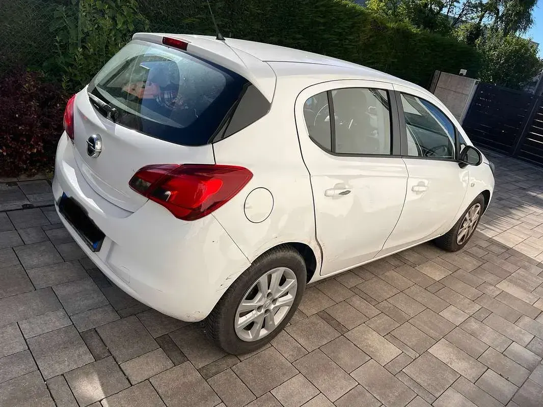 Używany Opel Corsa 90 KM (66 kW) 2015 Biały Hatchback