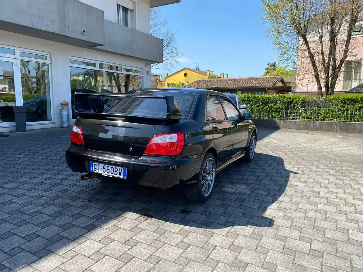 Usado Subaru Impreza 224 CV (164 kW) 2003 Negro Familiar