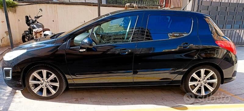 Usata Peugeot 308 112 CV (82 kW) 2012 Nero Berlina