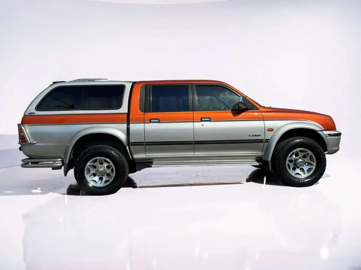 Occasion Mitsubishi L200 101 ch (74 kW) 2000 Orange Pick-up