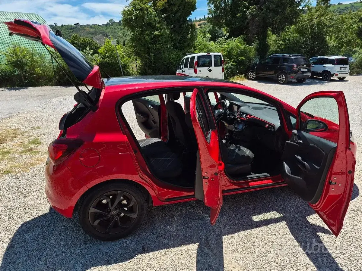 Usata Opel Corsa 95 CV (69 kW) 2015 Rosso Utilitaria