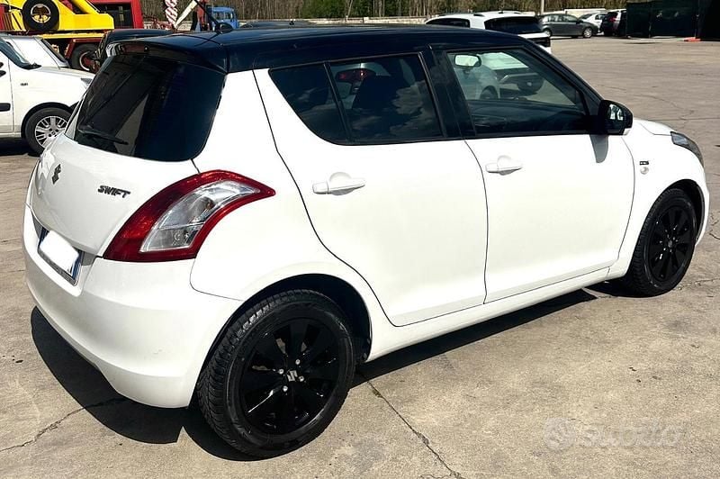 Second-hand Suzuki Swift Cool 75 CP (55 kW) 2015 Alb Hatchback