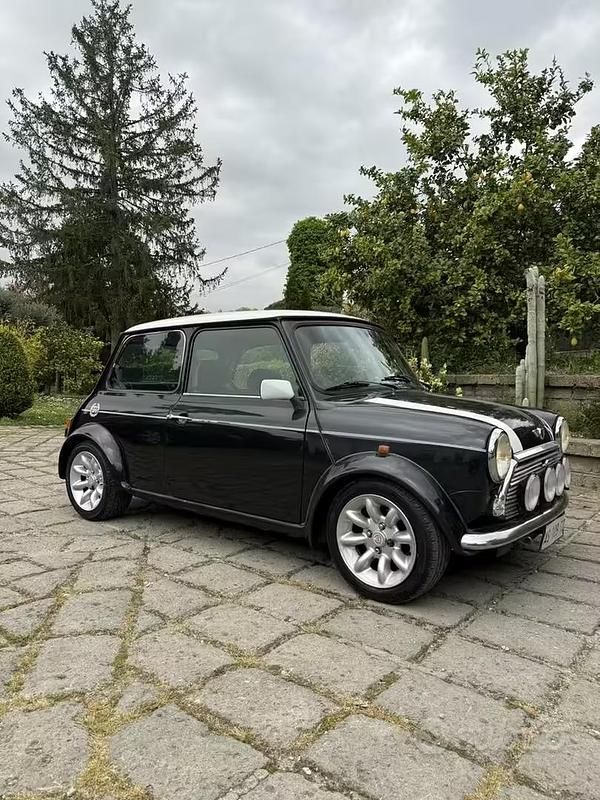 Usata Mini 1300 Sport 63 CV (46 kW) 1997 Nero Utilitaria