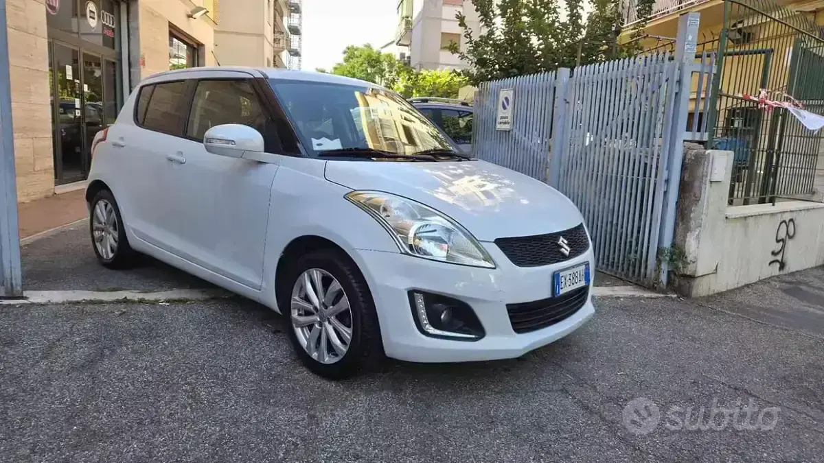 Usata Suzuki Swift 94 CV (69 kW) 2014 Bianco Utilitaria