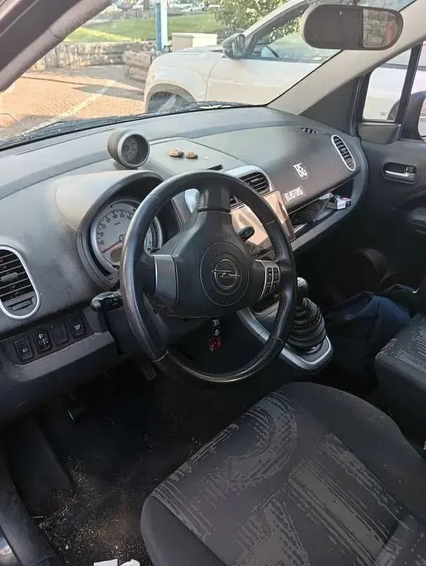 Usata Opel Agila Enjoy 94 CV (69 kW) 2012 Nero Utilitaria