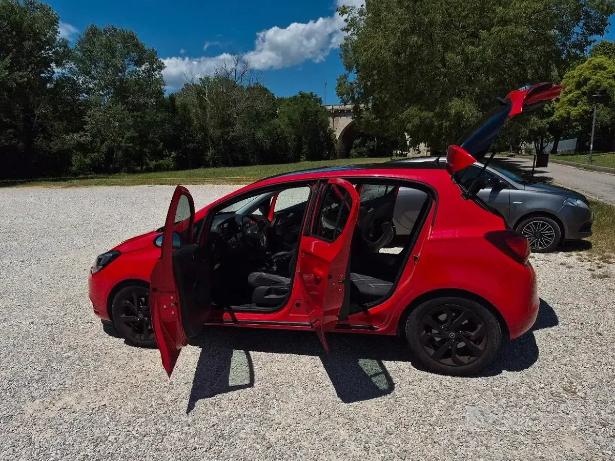 Usata Opel Corsa 95 CV (69 kW) 2015 Rosso Utilitaria
