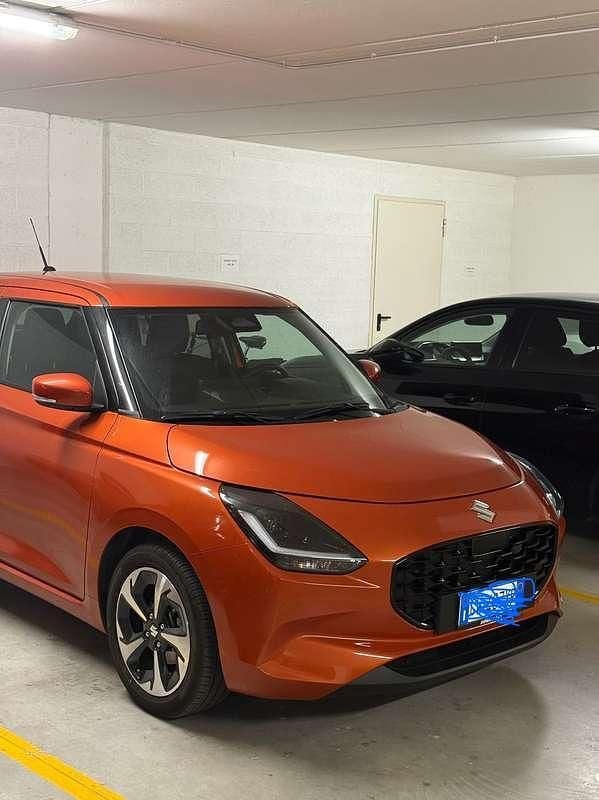 Usata Suzuki Swift 83 CV (61 kW) 2025 Arancione Berlina