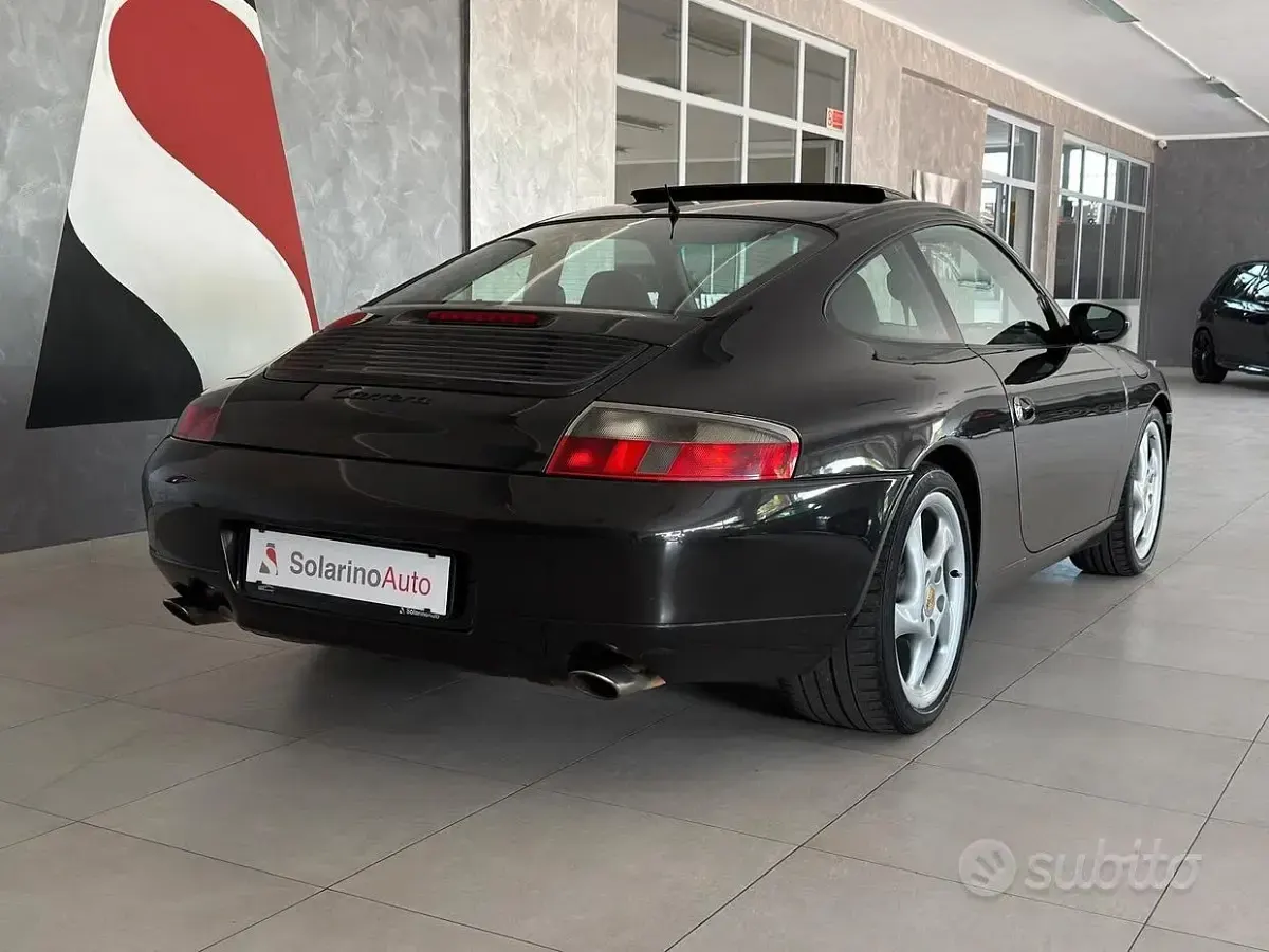 Begagnad Porsche 911 Carrera 301 HK (221 kW) 1999 Grå Sportkupé