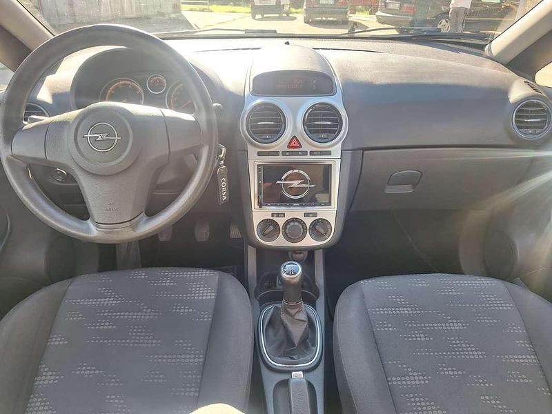 Usata Opel Corsa Edition 95 CV (69 kW) 2012 Argento Berlina