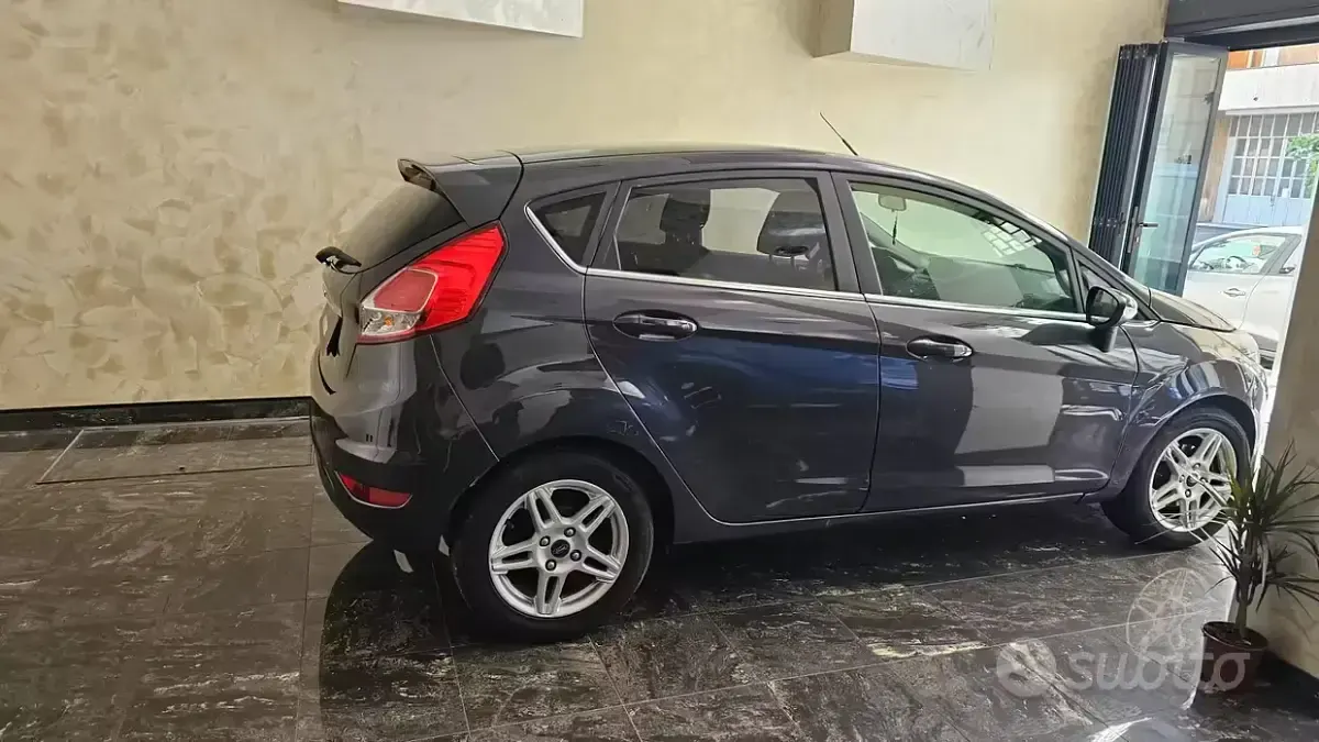 Second-hand Ford Fiesta Titanium 97 CP (71 kW) 2014 Albastru Hatchback