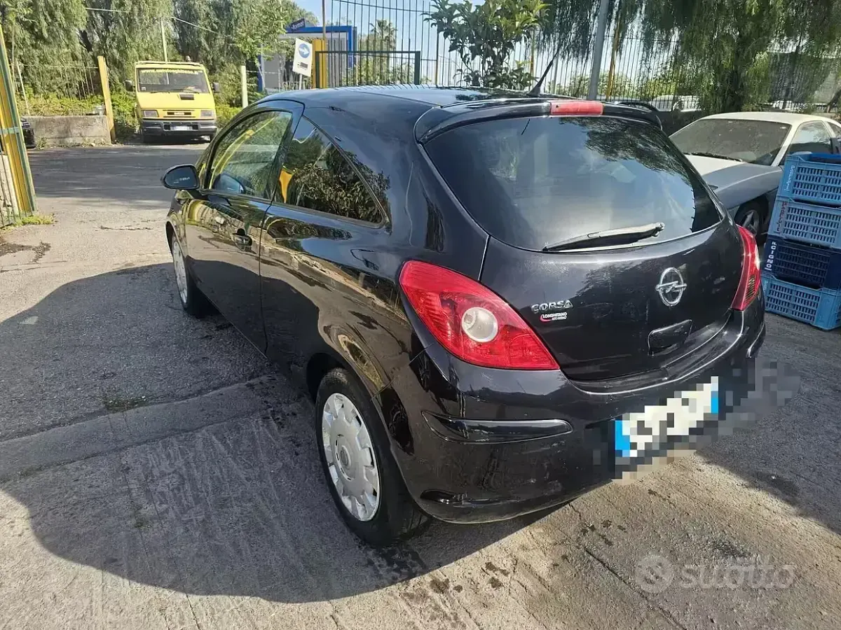 Usata Opel Corsa Club 65 CV (47 kW) 2012 Nero Utilitaria